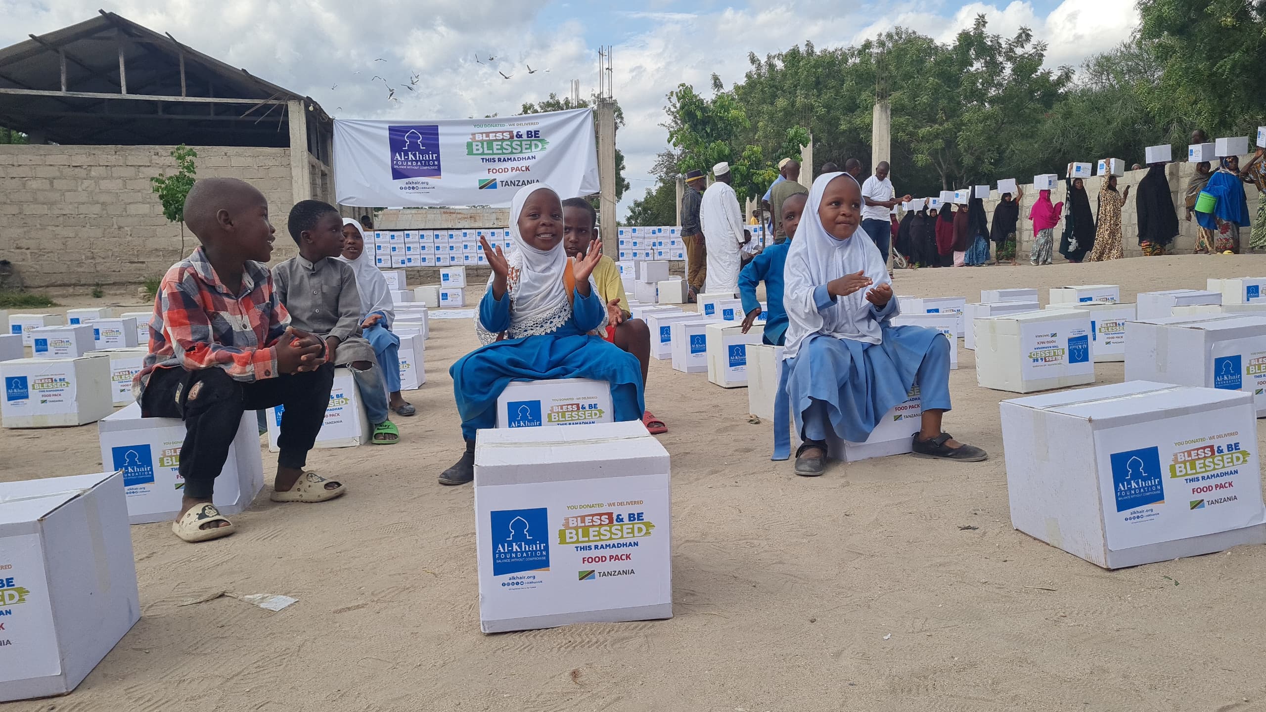 Food distribution to families in need - Ahsante Foundation Tanzania humanitarian work